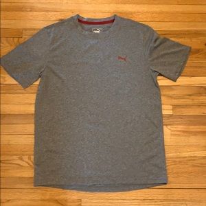 A grey with red short sleeved t-shirt.